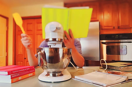 bokeh shot of white and silver stand mixer thumbnail
