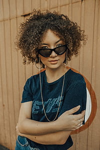 woman in sunglasses stainding thumbnail