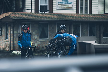 Two Man Riding Black Mountain Bikes thumbnail