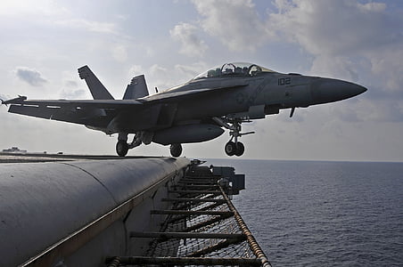 gray fighter jet take off on the aircraft carrier thumbnail