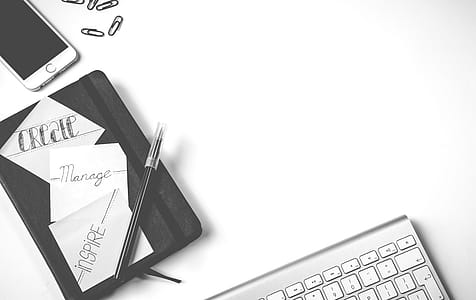 Black Pen Near Iphone and Apple Magic Keyboard thumbnail