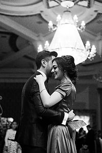 greyscale photography of dancing couple thumbnail