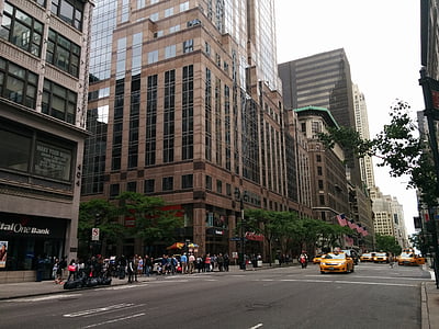 people gathering near brown concrete buildng thumbnail