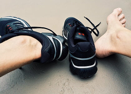 person wearing black Under Armour shoes thumbnail