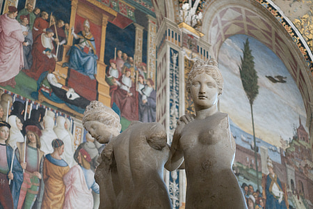 three female statue inside building thumbnail