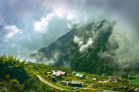 Bird's Eye View Photo of Houses on Mountain thumbnail