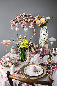 Easter table with cute pink decorations, flowers, catkins and eggs thumbnail