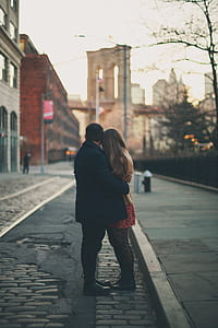 male and female couple standing on road thumbnail
