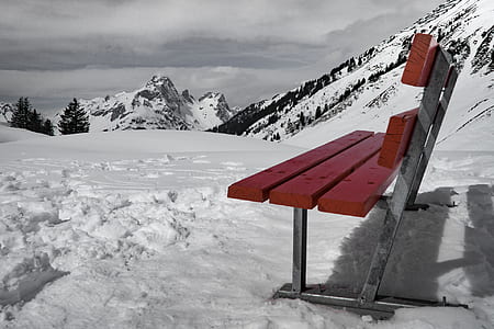 Grey and Brown Bench on Snow Near Mountain during Daytime thumbnail