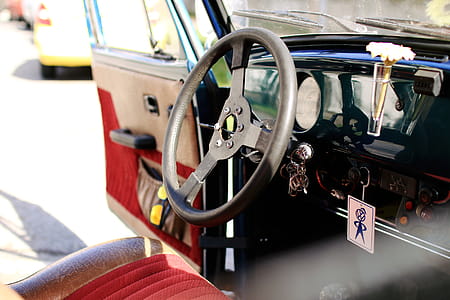Interior of old car with open door thumbnail