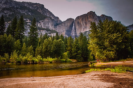body of water near cliff thumbnail