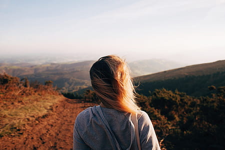 person looking at mountain during daytime thumbnail
