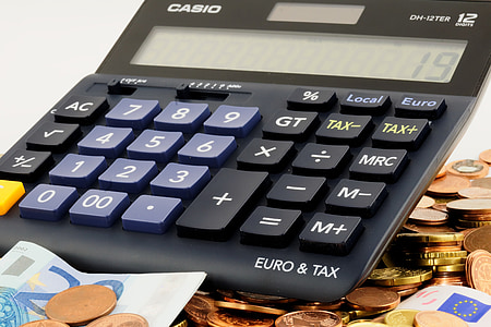 close-up photo of black Casio DH-12TER desk calculator displaying 19 thumbnail