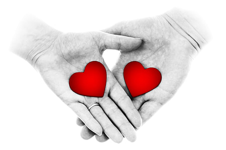 person's hand holding with heart thumbnail