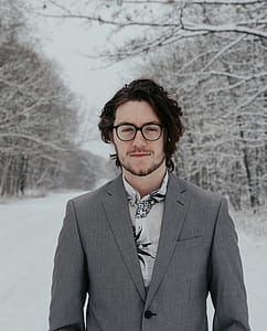 man wearing grey notched lapel suit jacket thumbnail