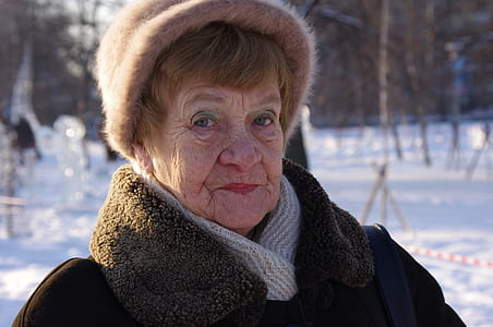 woman wearing gray coat thumbnail