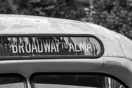 grayscale photography of Broadway to Alma car route signage thumbnail
