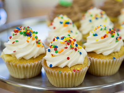 photo of cupcakes vanilla toppings and candy sprinkles thumbnail
