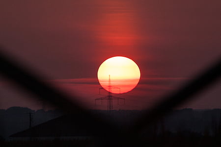 silhouette of network tower under the golden hour thumbnail