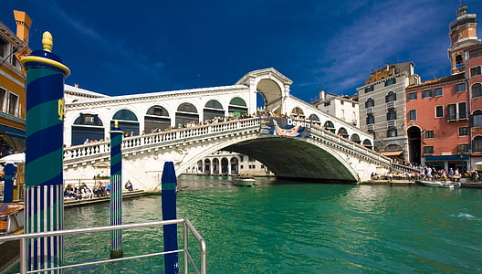 group of people on white bridge during daytime thumbnail