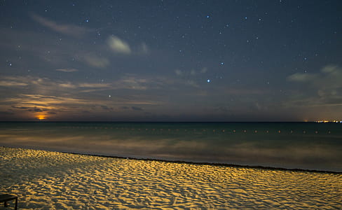seashore during nightime thumbnail