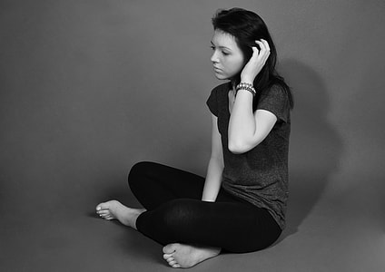 woman wearing black scoop neck shirt and pants thumbnail
