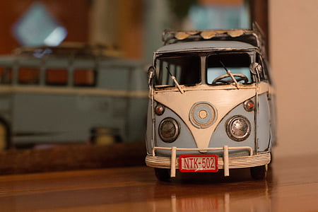 selective focus and closeup photography of die-cast van thumbnail