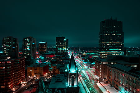aerial view of high-rise building during nighttime thumbnail