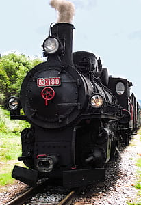 black locomotive during daytime thumbnail