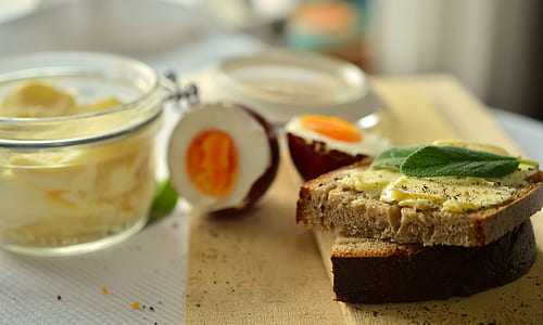 wheat bread beside butter jar thumbnail
