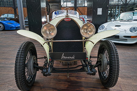 vintage car near white car thumbnail