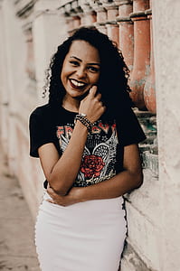 woman near wall thumbnail