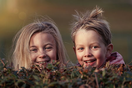 girl and boy outside room during daytime thumbnail