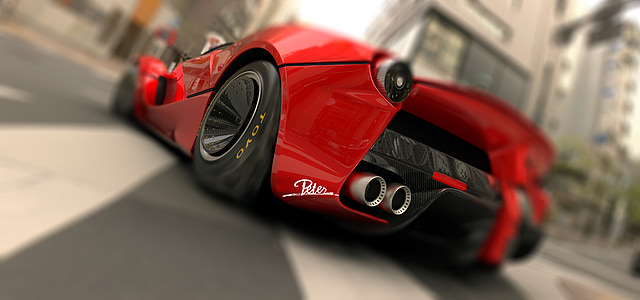 red and black sports coupe thumbnail