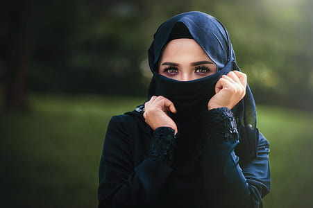 woman wears black abaya dress thumbnail