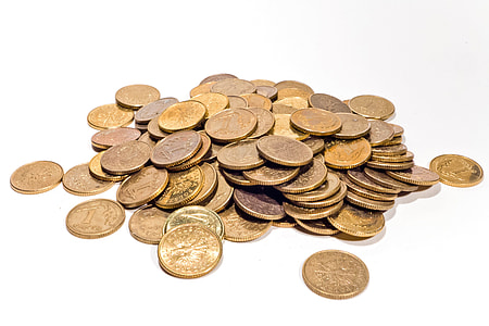 round gold-colored coins on white surface thumbnail