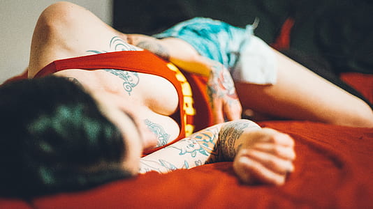 woman lying on bed thumbnail