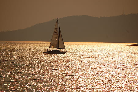white and black sailboat during daytime thumbnail