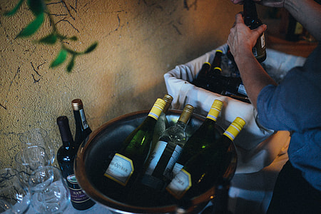 liquor bottles in gray bucket thumbnail