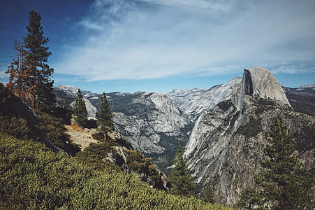 landscape photography of brown mountain ranges thumbnail