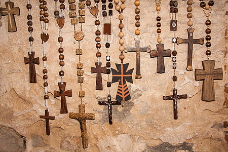 assorted-design brown wooden cross pendant art illustration thumbnail