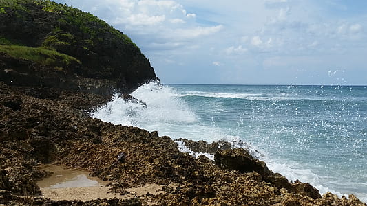 body of water in front of mountain thumbnail