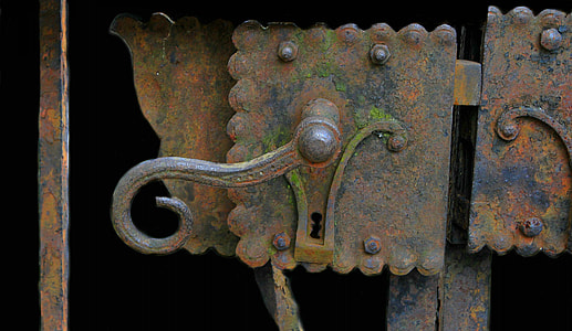 close-up photo of brown metal gate handle thumbnail