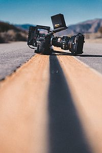 selective focus photograph of black professional video camera thumbnail