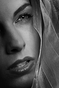 grayscale photography of woman face thumbnail
