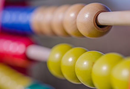 brown, yellow, red, and blue toy thumbnail