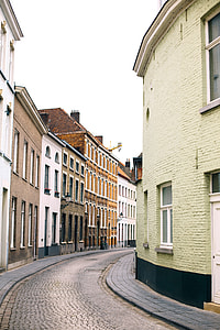 clear road way between buildings\ thumbnail
