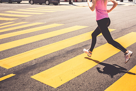 Blonde Woman Running Over The Pedestrian Crossing thumbnail