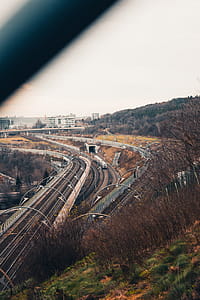 Train tracks to Prague city surrounded with trees and foliage thumbnail