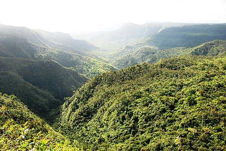 bird's-eye view photography of green mountains thumbnail